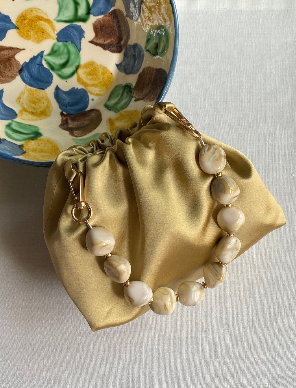 Bolso Ágata dorado satinado