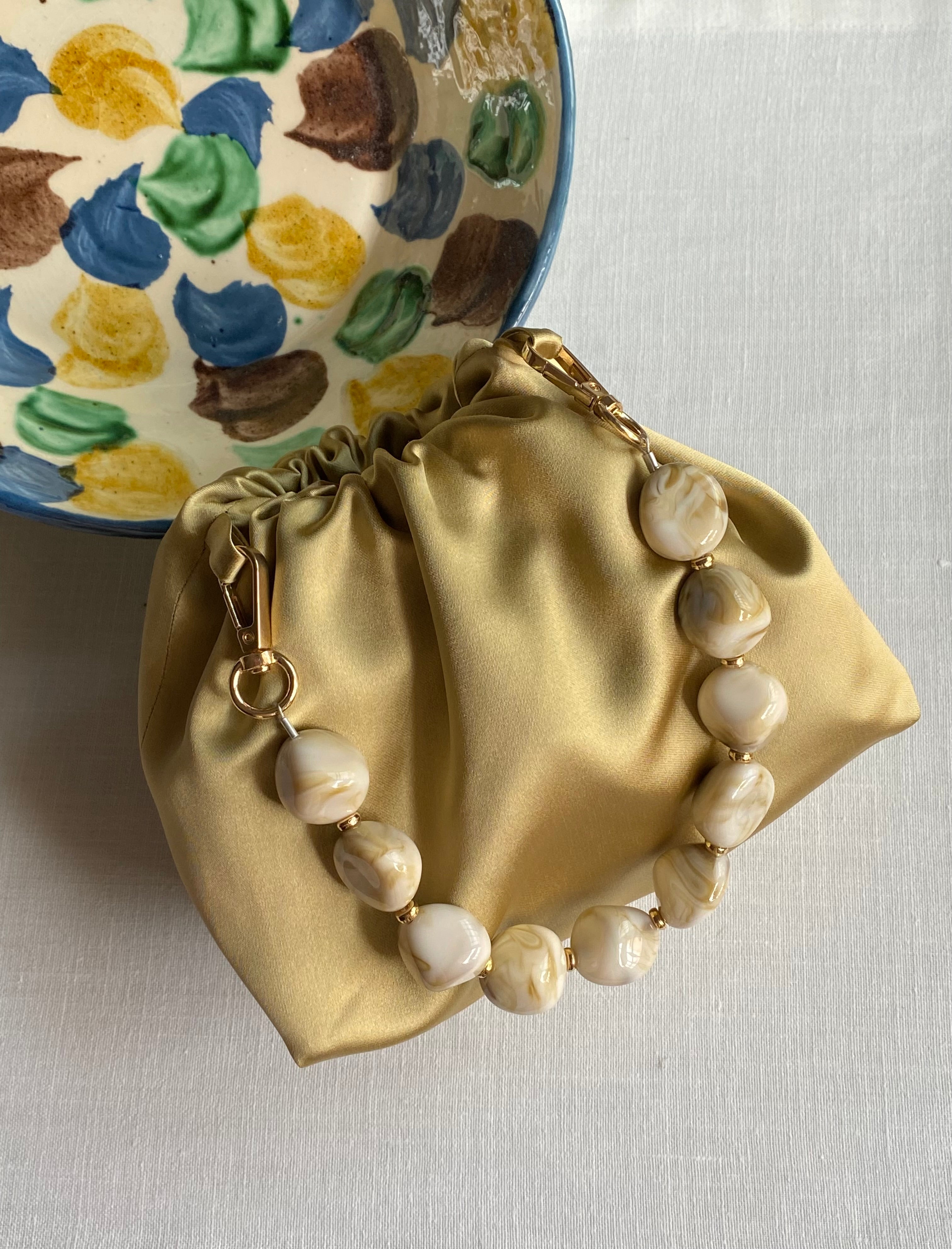 Bolso Ágata dorado satinado