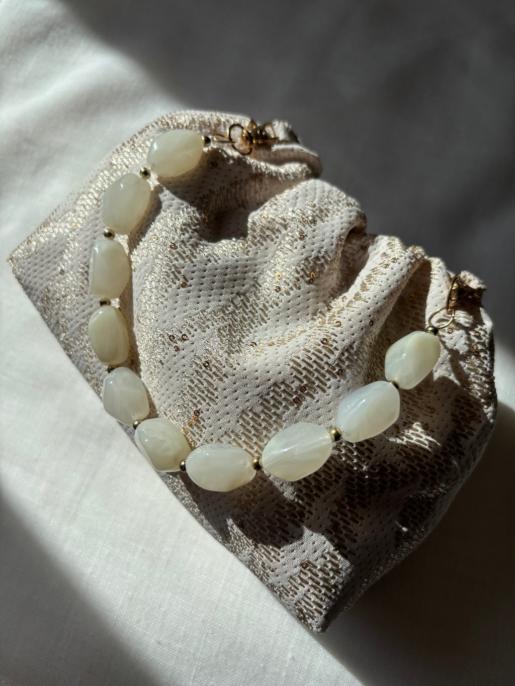 Bolso Ágata beige lentejuelas