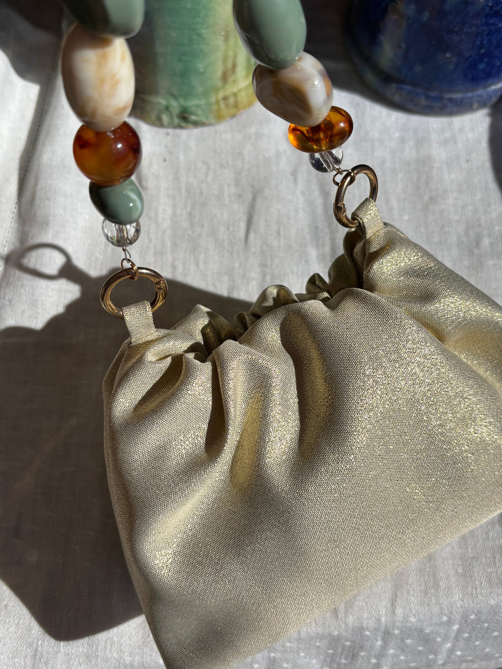 Bolso Ágata dorado brillante