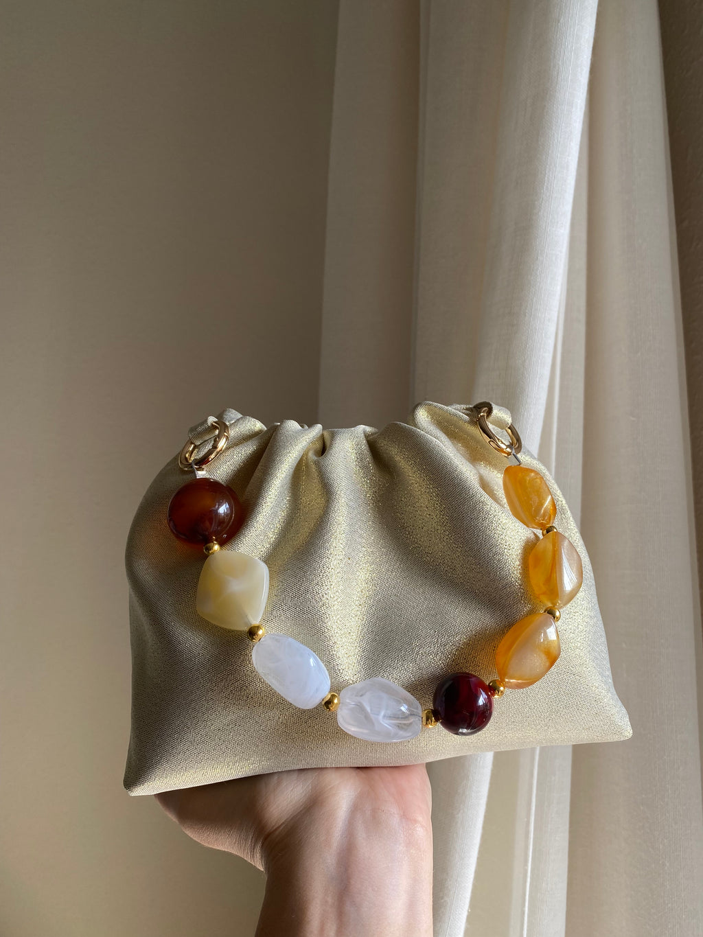 Bolso Ágata dorado brillante
